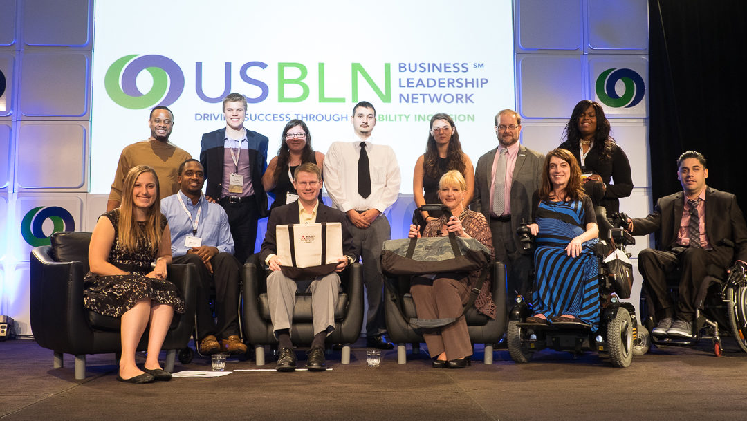 Group photo of participants on stage at the 2015 USBLN conference